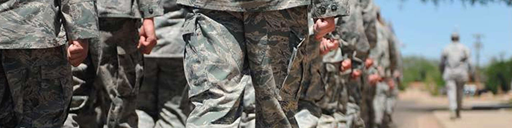 people in military uniform marching