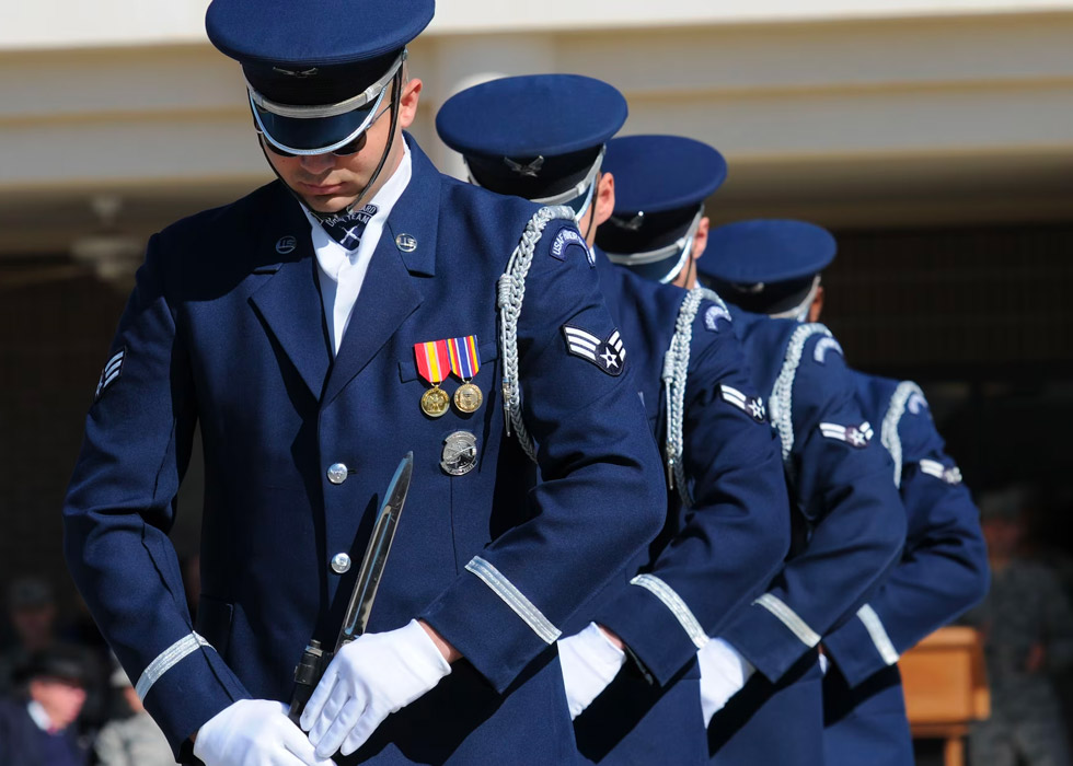 A formation of uniformed men standing together in a group