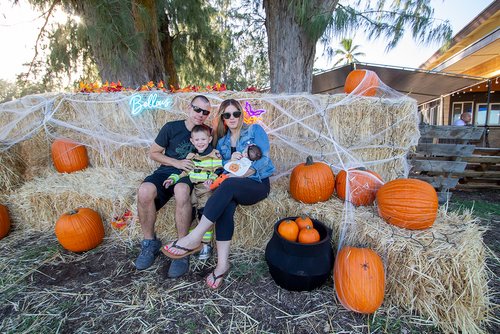 family taking photo on Halloween 