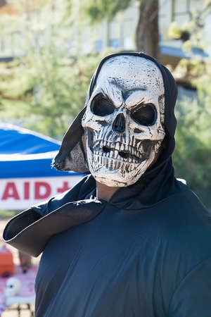 a person wearing a skeleton mask