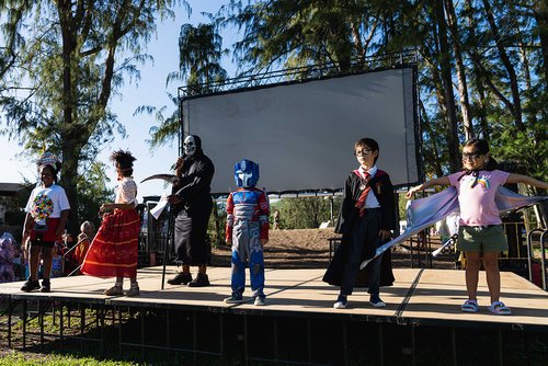 a group of people standing on stage 