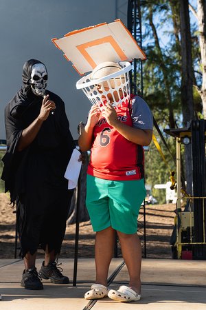 a person holding a basket over their head