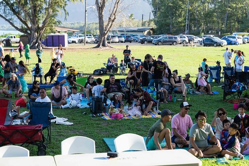 a group of people in a park<br />
