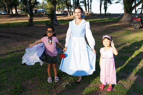 a person and two children posing for a picture<br />
