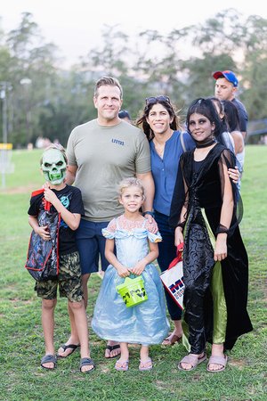 a group of people posing for a photo