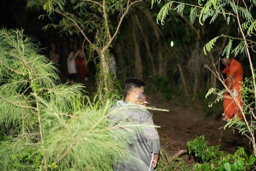 a group of people in the woods<br />
