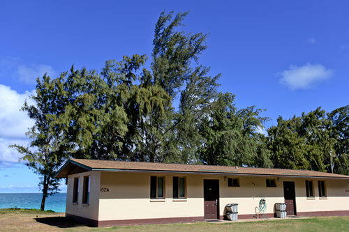 a house with trees in the background<br />
