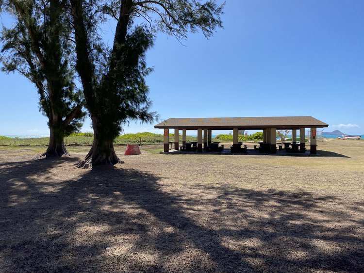 a picnic area with tables and benches