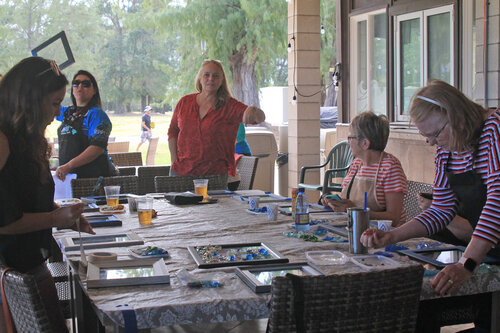 a group of people sitting around a table