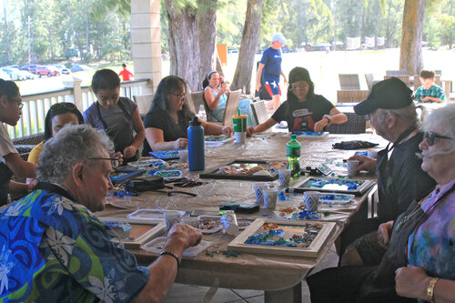 a group of people sitting around a table