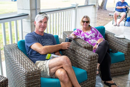 a man and a woman sitting on a couch 