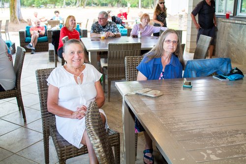 two ladies sitting at the table