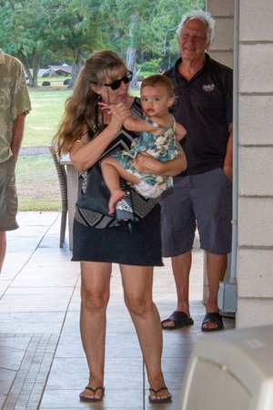 a lady carrying her baby