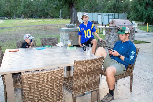 a group of people sitting at a table<br />
