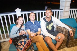 a group of people sitting on a couch<br />
