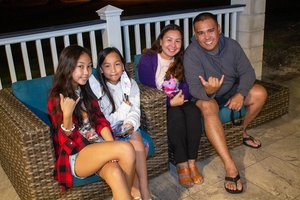 a group of people sitting on a couch