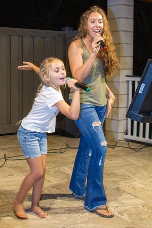 mom and kid singing 