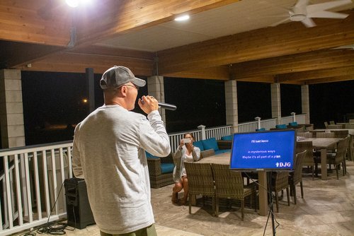 a man singing on a microphone