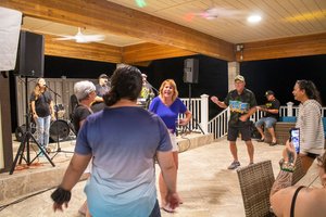 a group of friends happily dancing