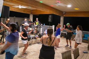 a group of friends happily dancing