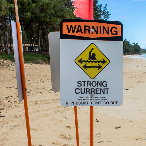 ocean safety warning sign