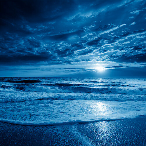 an image of the sea at night