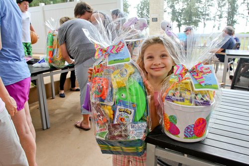 a child with two baskets