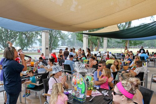 a group of people sitting on tables