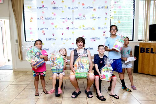 a group of kids posing for a picture