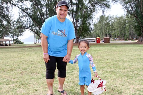 a person and a child posing for a picture<br />
