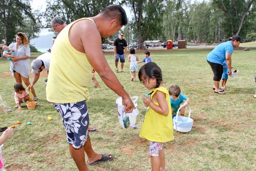 a person and a child in a park<br />
