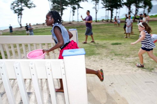 a child playing with a bucket<br />
