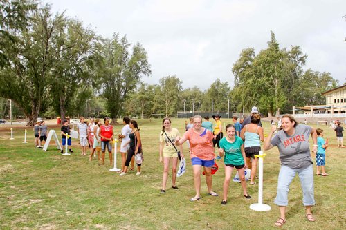 a group of people standing in a line<br />
