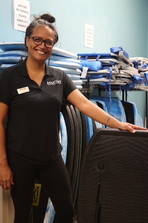 a person standing next to a chair