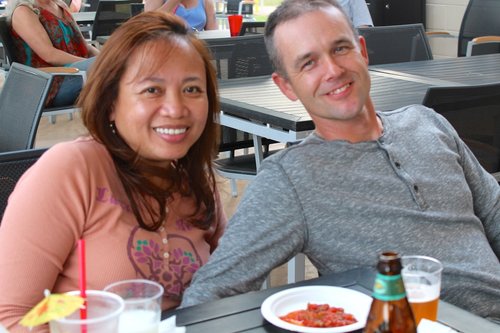 a man and a woman sitting at a table 