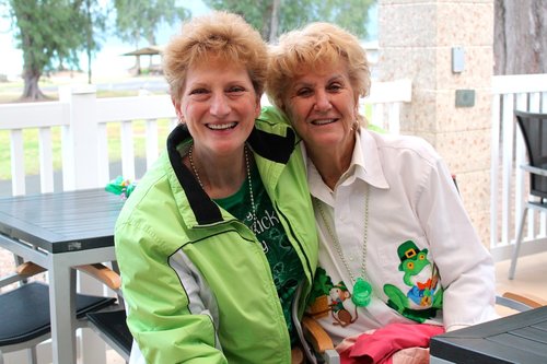 two ladies posing for a photo 