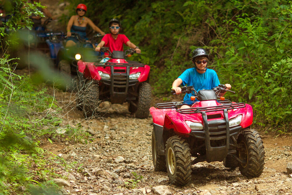 a group of people on atvs<br />
