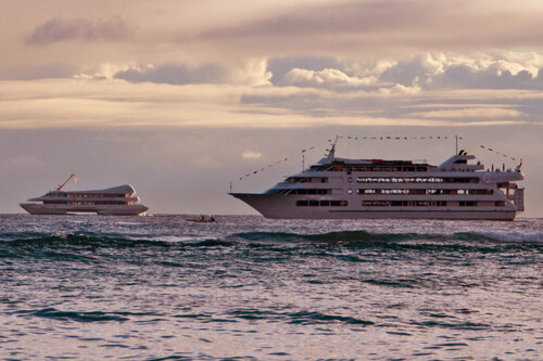 a large white ship in the water