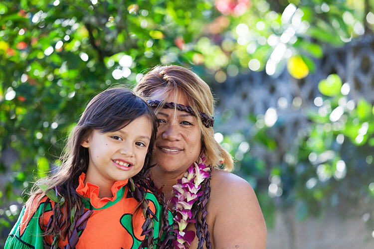 a person and a child posing for a picture