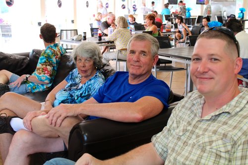 a group of people sitting in chairs<br />
