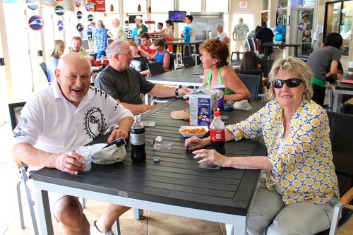 a group of people sitting at a table<br />
