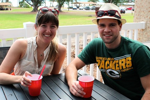 man and woman  sitting at a table<br />
