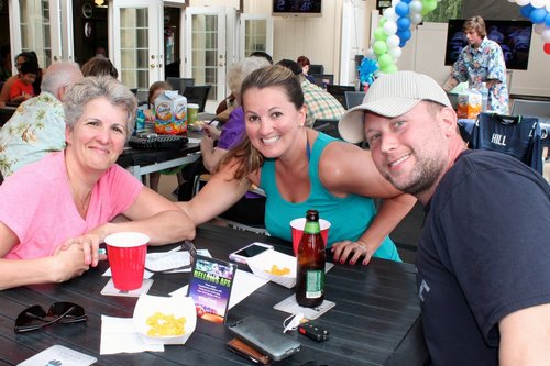 group of people sitting at a table 